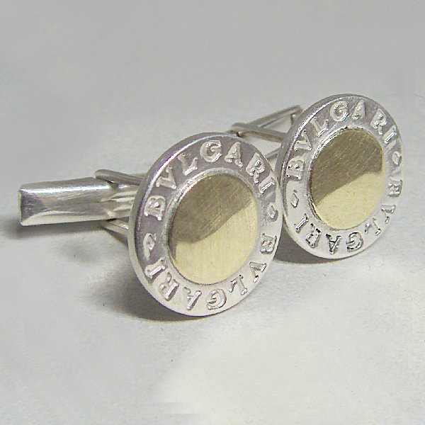 (c1297)Silver cufflinks with gold appliques.